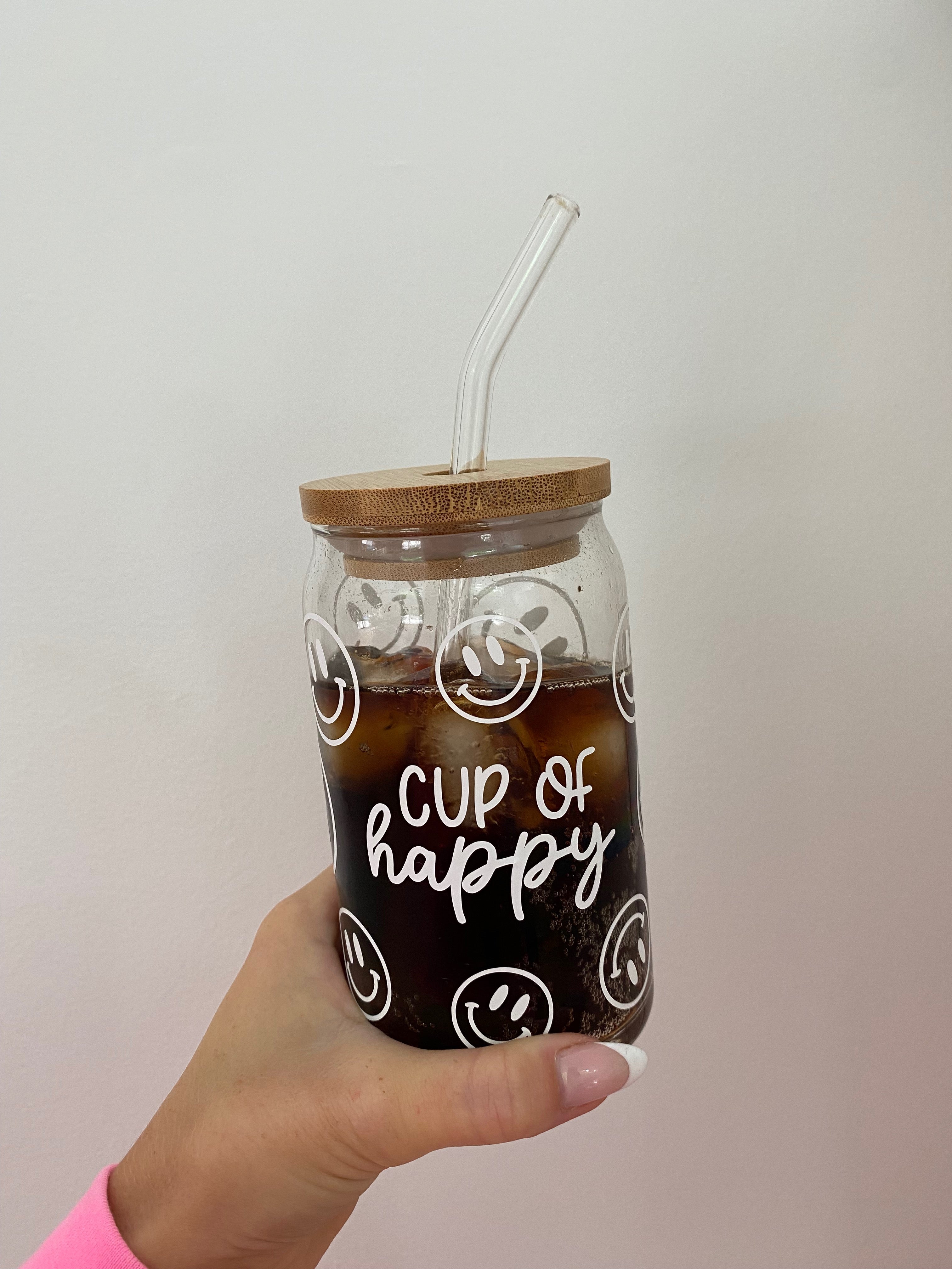 Iced coffee in jar, mug glass cup on the white table Stock Photo